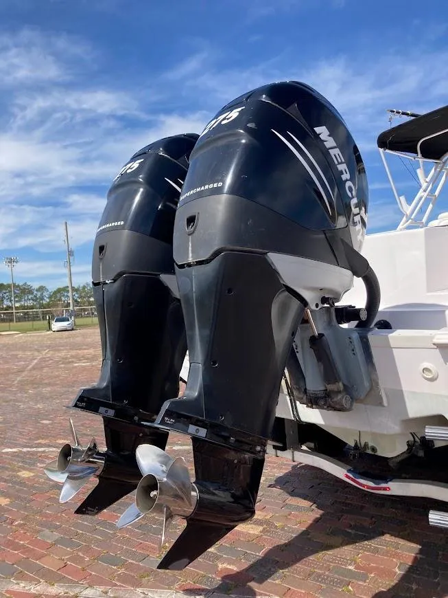 Slide: The Image of Twin Mercury outboard engines on a 2005 Donzi 35 ZFC DAYTONA boat. - 11