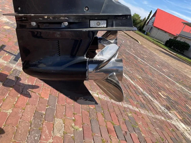 Slide: The Image of Close-up of a 2005 Donzi 35 ZFC DAYTONA boat propeller on brick pavement. - 14