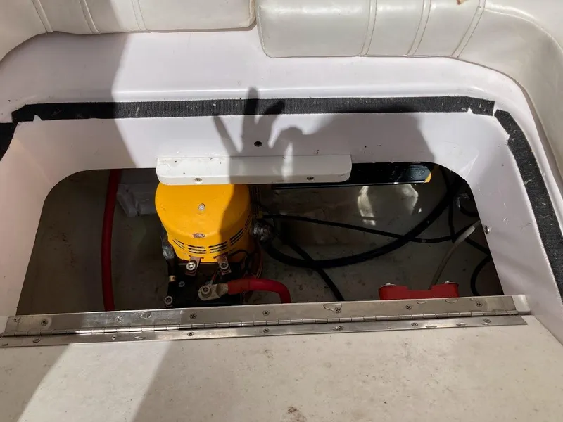 Slide: The Image of 2005 Donzi 35 ZFC DAYTONA boat interior with visible engine components. - 20