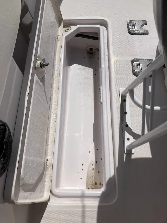 Slide: The Image of Open storage compartment on 2005 Donzi 35 ZFC DAYTONA boat deck. - 33