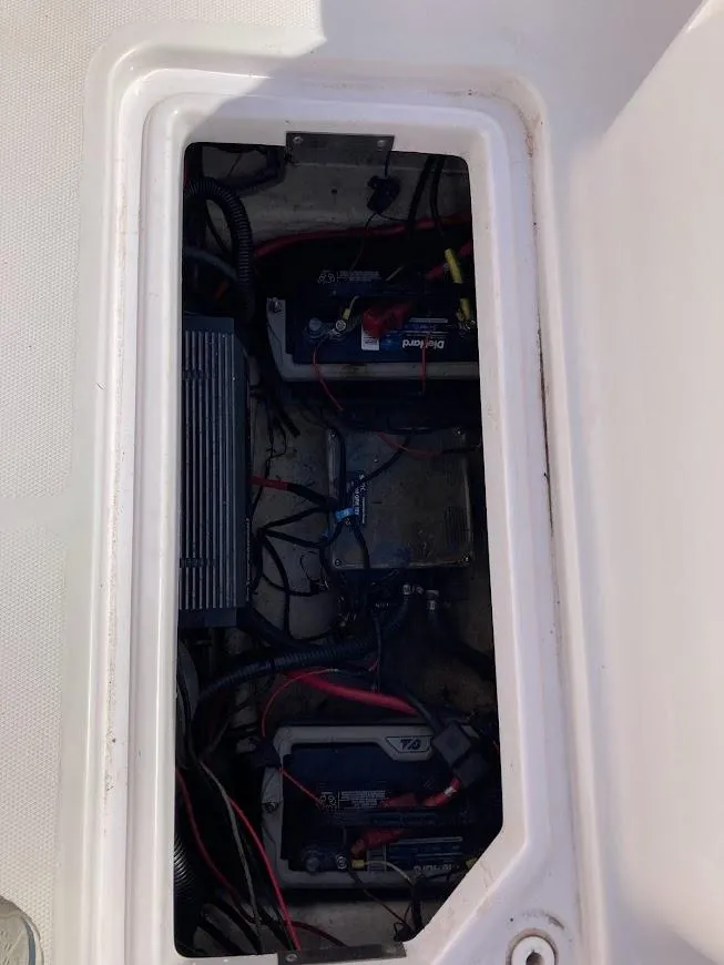Slide: The Image of 2005 Donzi 35 ZFC Daytona boat battery compartment with wiring. - 36