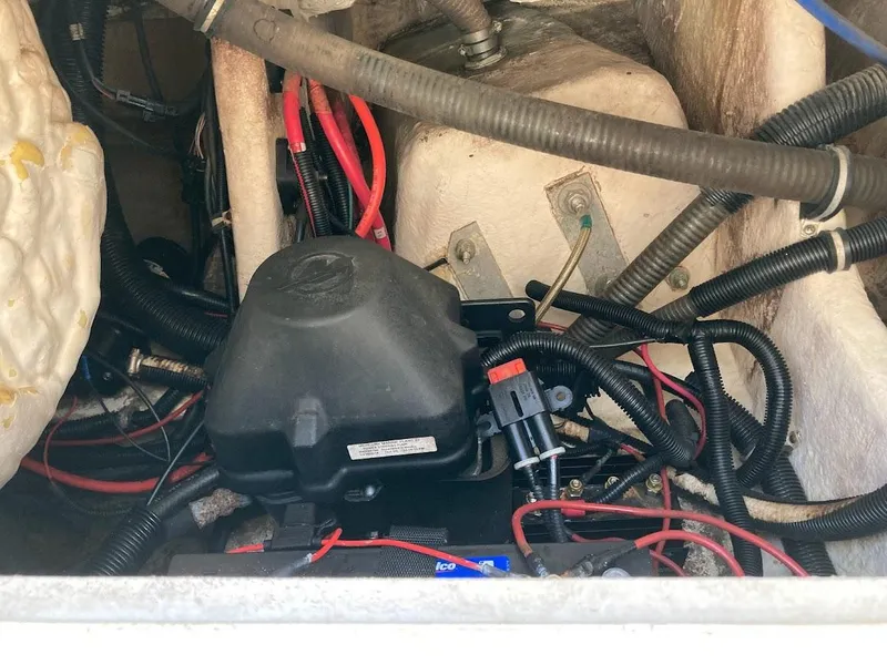 Slide: The Image of Engine compartment of a 2005 Donzi 35 ZFC DAYTONA with wiring and components. - 38