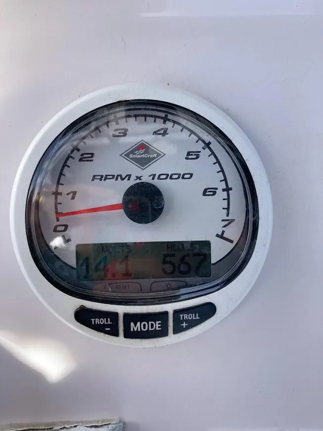 Slide: The Image of Close-up of 2005 Donzi 35 ZFC Daytona tachometer displaying RPM and hours. - 49