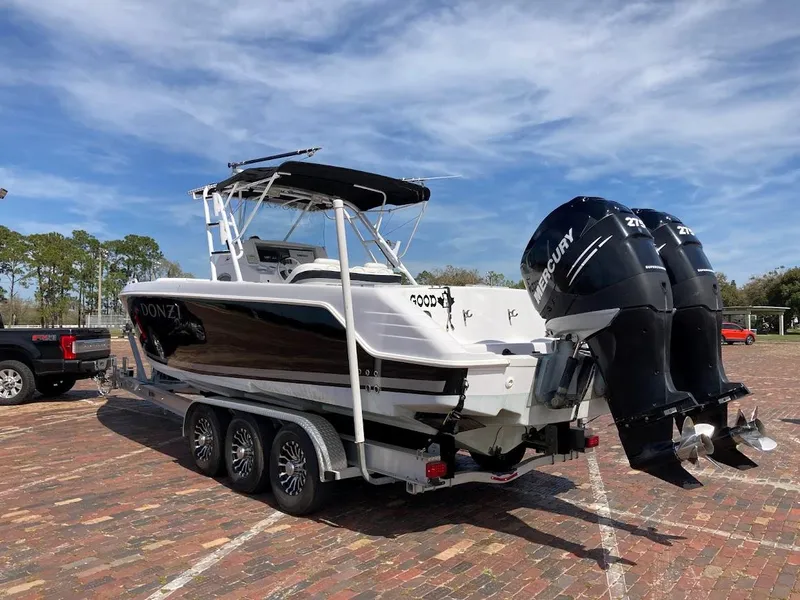 Slide: The Image of 2005 Donzi 35 ZFC DAYTONA boat on trailer with twin Mercury engines. - 7