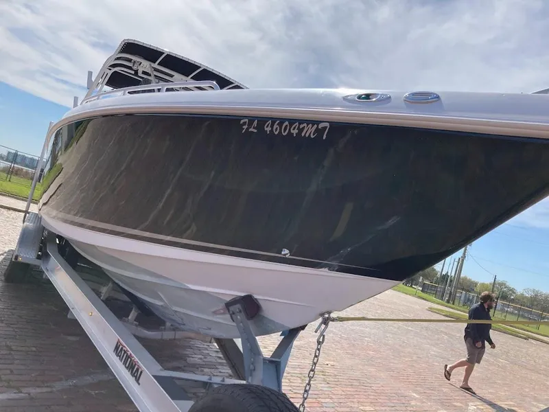 Slide: The Image of 2005 Donzi 35 ZFC DAYTONA boat on trailer, side view, outdoors. - 9