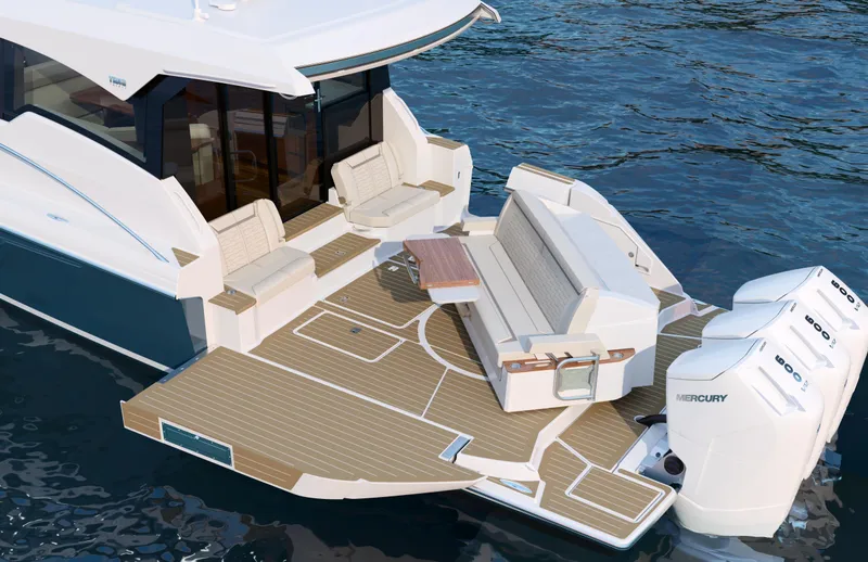 Slide: The Image of 2025 Tiara Yachts 48LE luxury boat with spacious deck and powerful Mercury engines. - 12