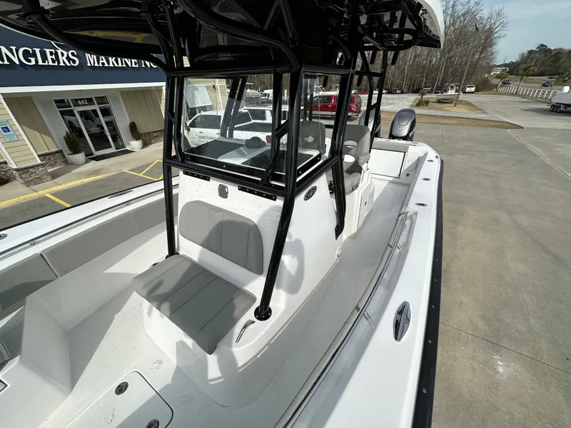 Slide: The Image of 2026 Cape Horn 32 XS boat with sleek design, docked at a marina. - 30