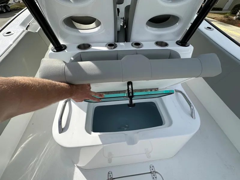 Slide: The Image of 2026 Cape Horn 32 XS boat interior with open storage compartment. - 15