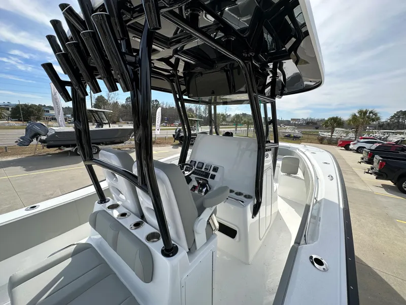 Slide: The Image of 2026 Cape Horn 32 XS boat interior with sleek design and modern controls. - 17