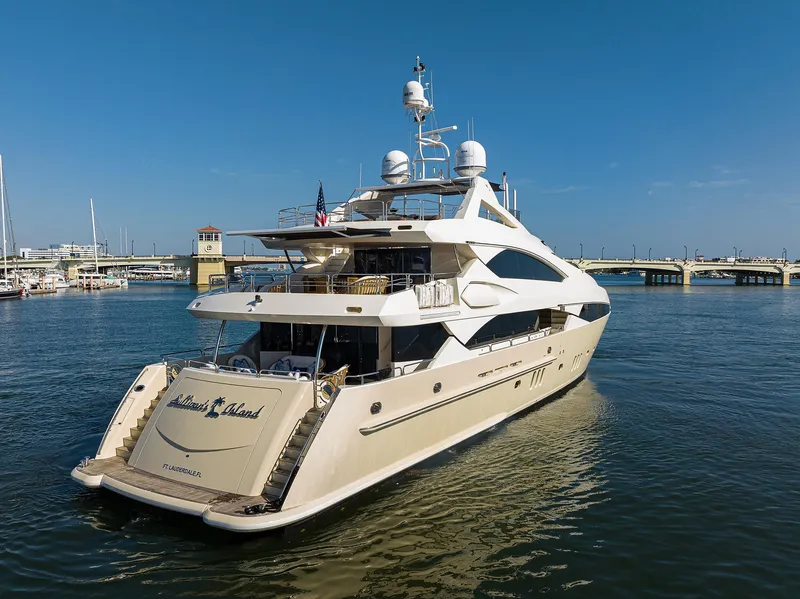 Slide: The Image of Luxurious 2009 Sunseeker Trideck yacht docked in a marina. - 12