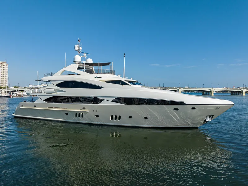 Slide: The Image of 2009 Sunseeker Trideck yacht on calm water with clear blue sky. - 2