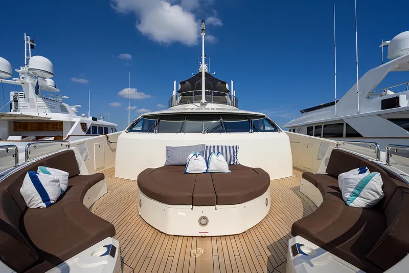 Slide: The Image of Luxurious 2009 Sunseeker Trideck yacht with spacious outdoor seating area and plush cushions. - 20