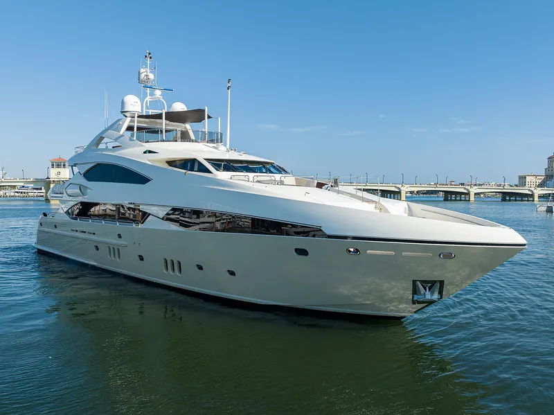 Slide: The Image of 2009 Sunseeker Trideck yacht on calm water with clear blue sky. - 3
