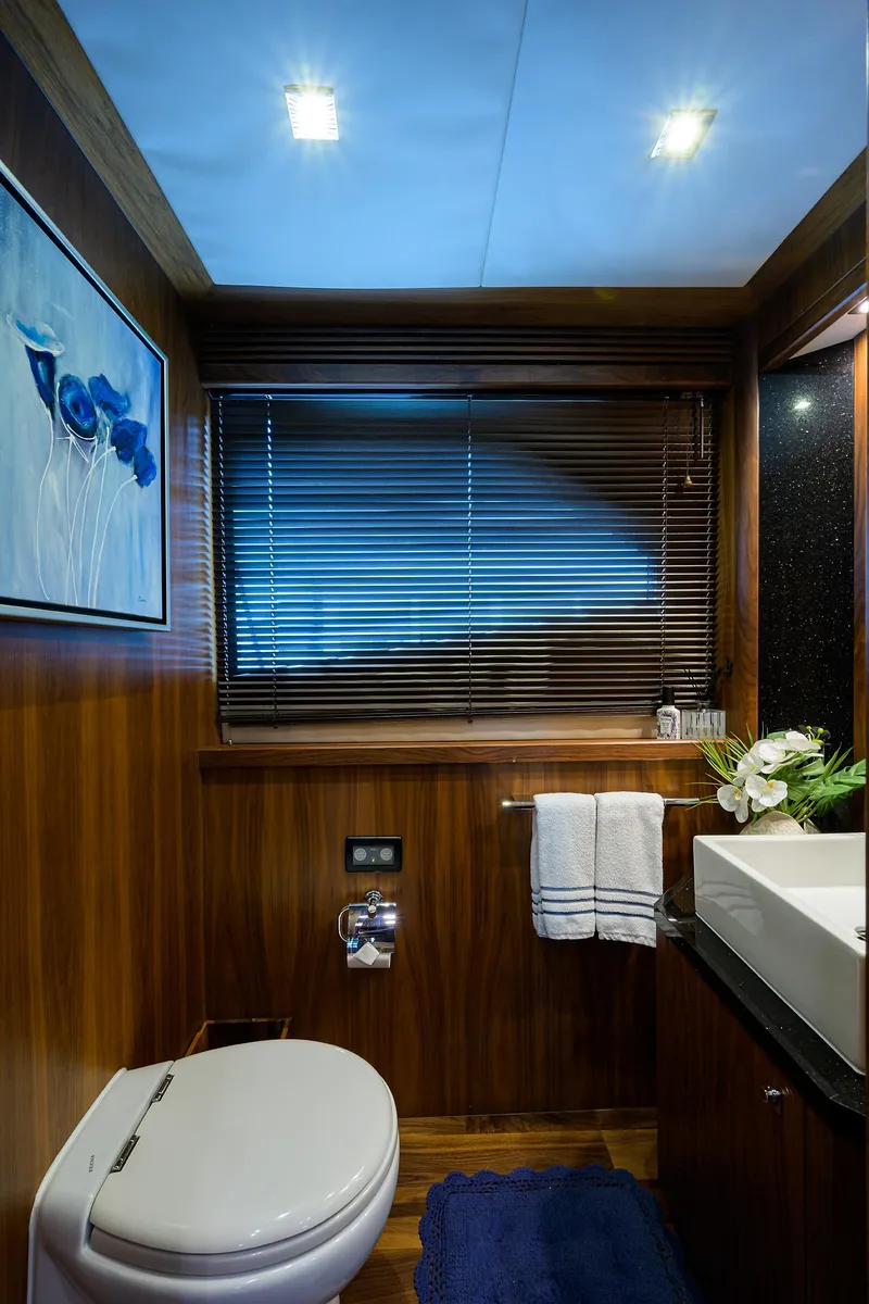 Slide: The Image of Luxurious bathroom on a 2009 Sunseeker Trideck yacht with modern fixtures. - 38