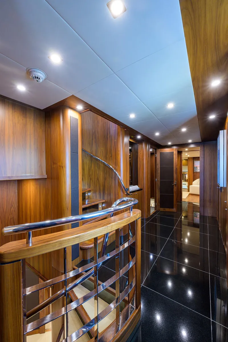 Slide: The Image of Luxurious interior of 2009 Sunseeker Trideck yacht with modern wood and metal finishes. - 40