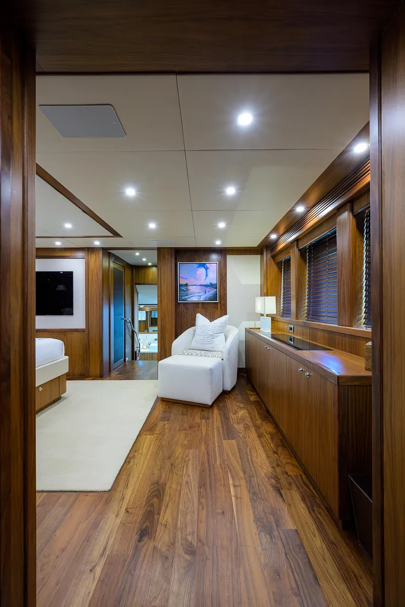 Slide: The Image of Luxurious interior of a 2009 Sunseeker Trideck yacht with wooden flooring and modern furnishings. - 41