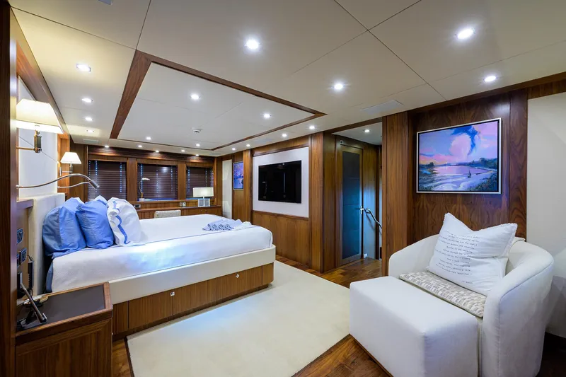 Slide: The Image of Luxurious bedroom interior of 2009 Sunseeker Trideck yacht with modern decor and ambient lighting. - 42