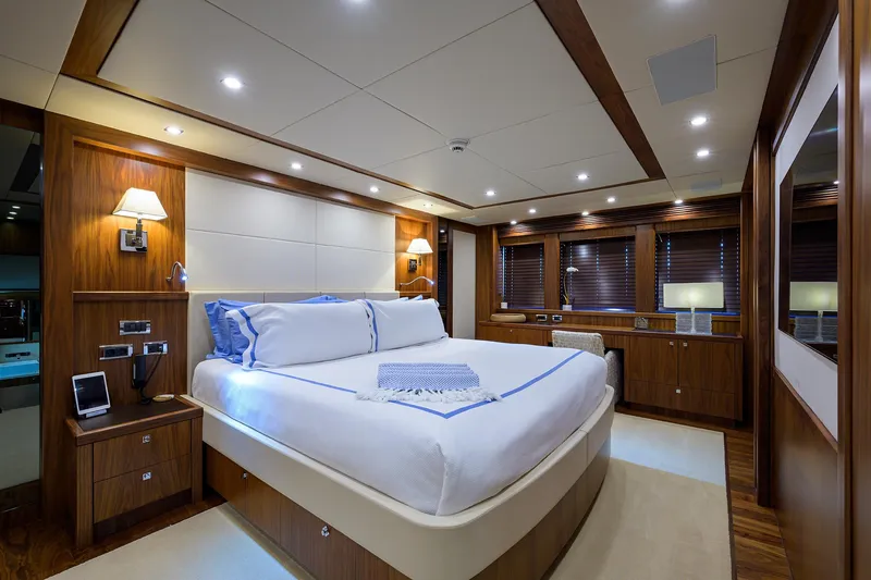 Slide: The Image of Luxurious bedroom interior of a 2009 Sunseeker Trideck yacht with modern amenities. - 44