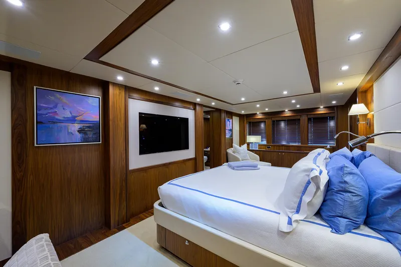 Slide: The Image of Luxurious bedroom interior of 2009 Sunseeker Trideck yacht with modern decor and ambient lighting. - 46