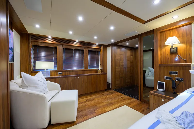 Slide: The Image of Luxurious interior of a 2009 Sunseeker Trideck yacht with wooden finishes and modern lighting. - 48
