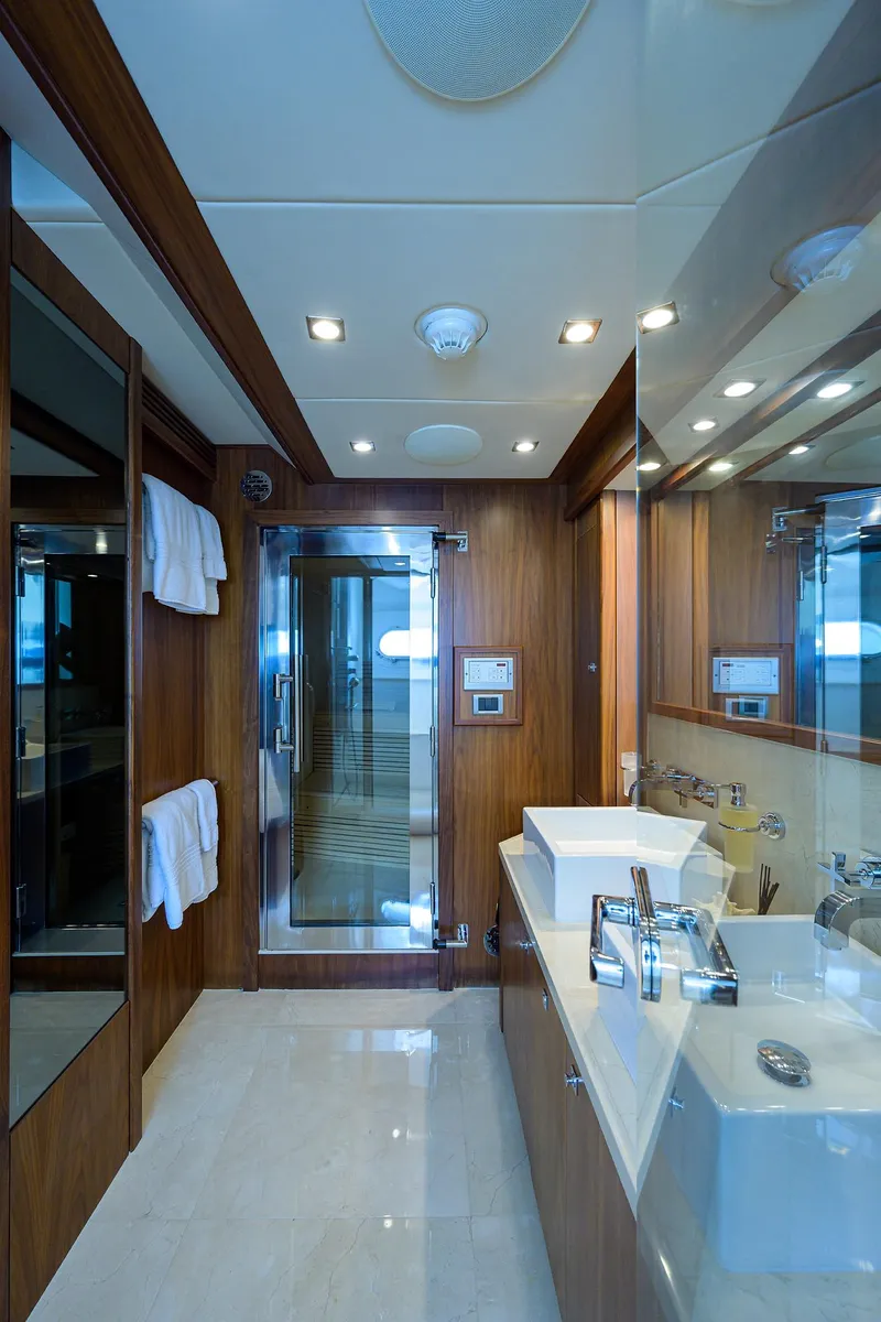 Slide: The Image of Luxurious bathroom on a 2009 Sunseeker Trideck yacht with modern fixtures. - 49