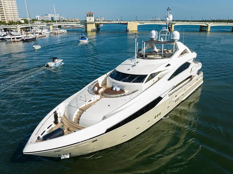 Slide: The Image of Luxury 2009 Sunseeker Trideck yacht cruising in a marina. - 6