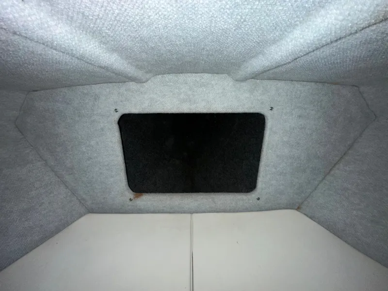 Slide: The Image of Interior cabin view of a 2005 Eliminator 260 Eagle XP boat. - 30