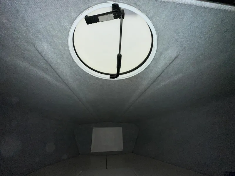 Slide: The Image of 2005 Eliminator 260 Eagle XP cabin interior with circular hatch. - 40