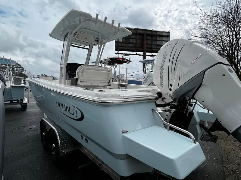 Slide: The Image of 2024 Robalo 266 Cayman boat with outboard motor on trailer. - 4