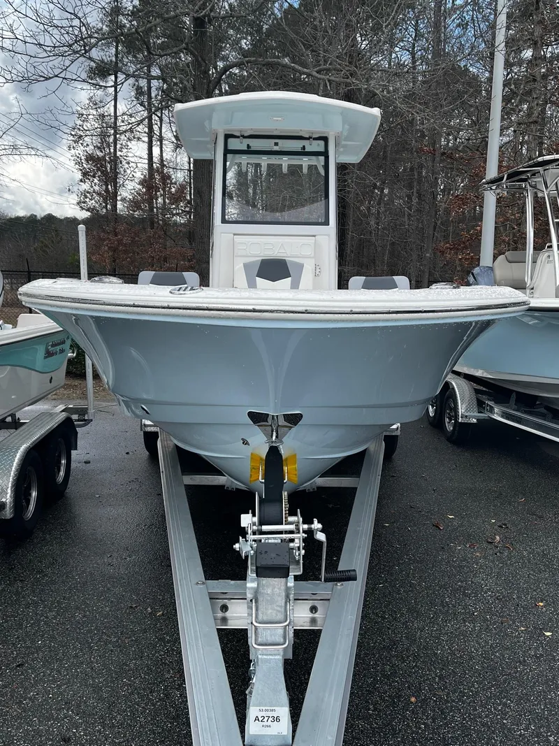 Slide: The Image of 2024 Robalo 266 Cayman boat on trailer, front view. - 6