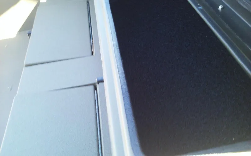 Slide: The Image of 2023 Thor Lake Hammer Elite storage compartment with black interior. - 11