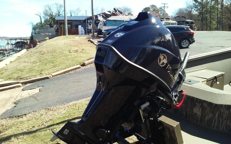 Slide: The Image of 2023 Thor Lake Hammer Elite outboard motor at lakeside dock. - 18