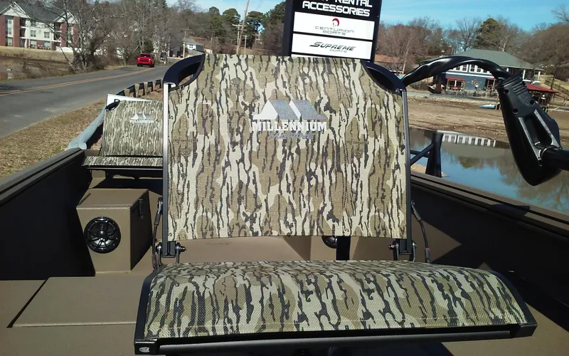 Slide: The Image of 2023 Thor Lake Hammer Elite boat with camouflage seating and accessories. - 3