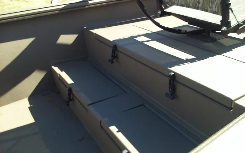 Slide: The Image of 2023 Thor Lake Hammer Elite boat interior with storage compartments. - 8