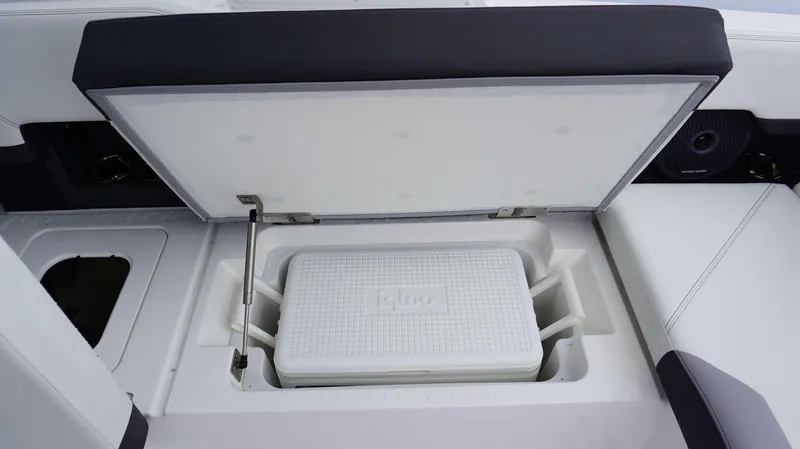 Slide: The Image of 2023 Cobalt R8 boat with built-in cooler storage compartment. - 17