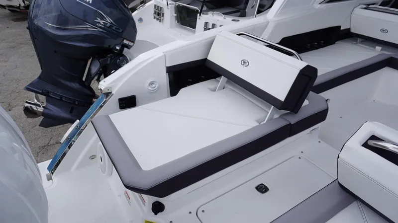 Slide: The Image of 2023 Cobalt R8 boat interior with Yamaha outboard motor, featuring sleek seating design. - 8