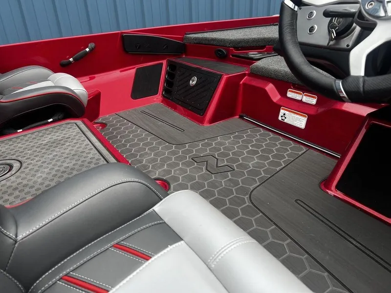 Slide: The Image of 2023 Nitro Z21 XL Pro boat interior with red and black accents. - 4