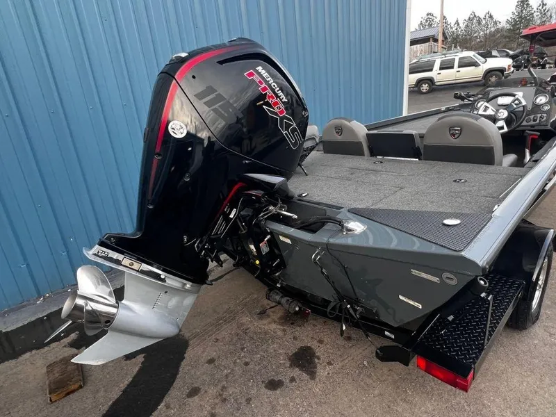 Slide: The Image of 2020 Triton 18 TX boat with Mercury Pro XS outboard motor. - 7