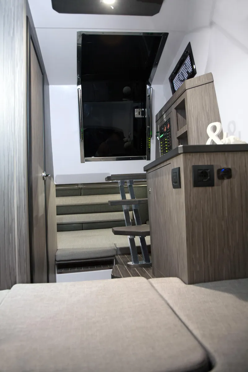 Slide: The Image of Interior of 2025 Ranieri CAYMAN 35.0 EXECUTIVE boat with modern design and seating. - 13