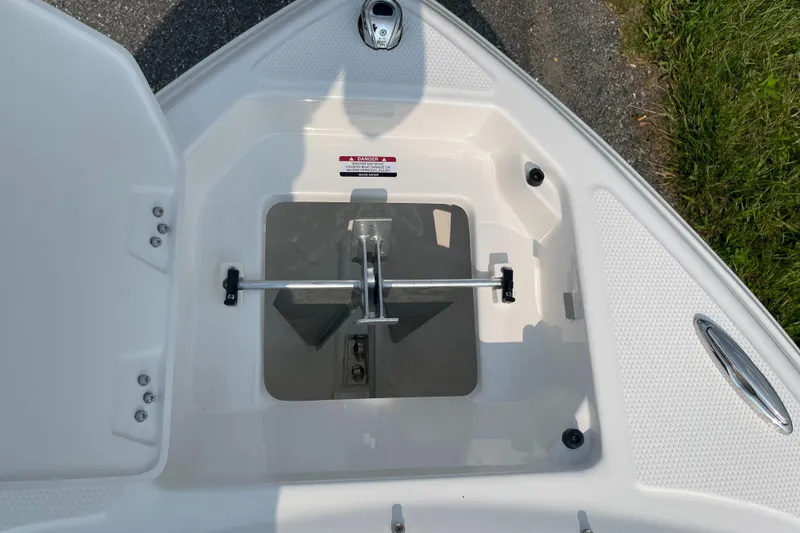 Slide: The Image of 2024 Chaparral 23 SSi OB anchor storage compartment. - 11