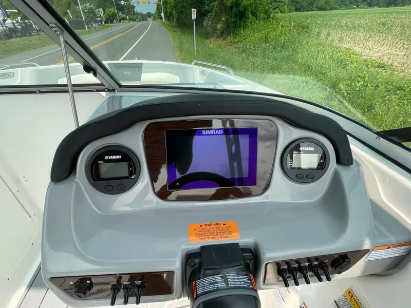 Slide: The Image of Dashboard of 2024 Chaparral 23 SSi OB boat with Simrad display. - 26