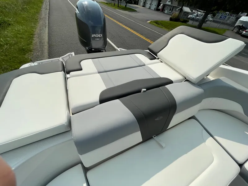 Slide: The Image of 2024 Chaparral 23 SSi OB boat with Yamaha 200 outboard motor, rear seating view. - 48