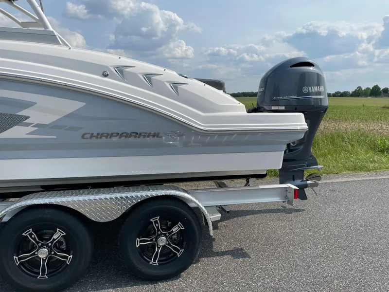 Slide: The Image of 2024 Chaparral 23 SSi OB boat on trailer with Yamaha outboard motor. - 9