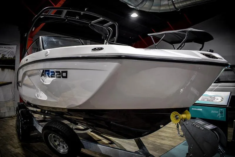 The Image of 2023 Yamaha Boats AR220 on display in showroom. - 1