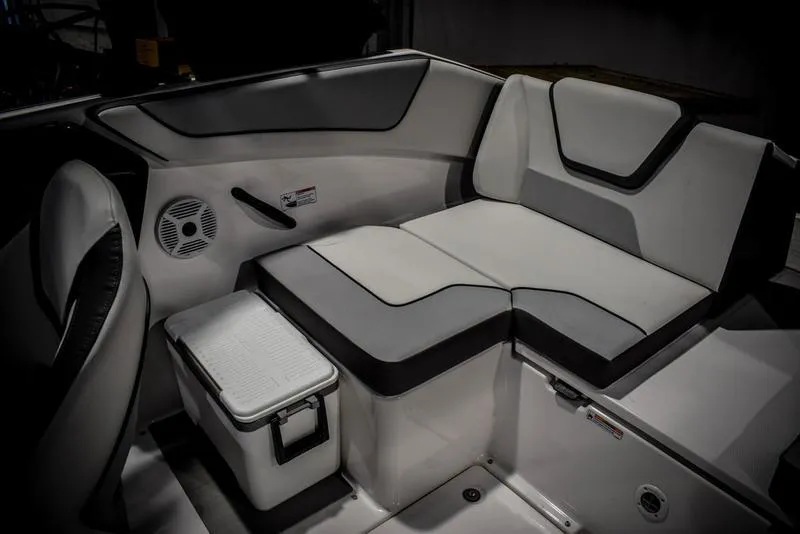 Slide: The Image of 2023 Yamaha Boats AR220 interior seating area with modern design. - 16