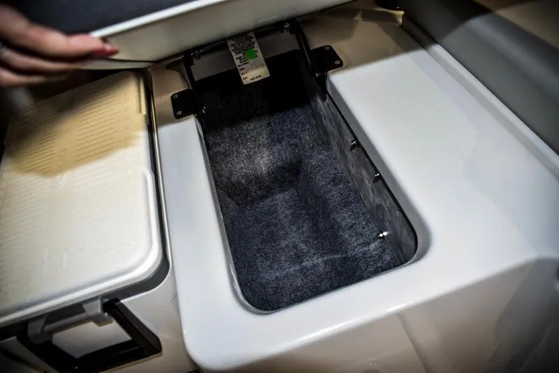 Slide: The Image of Storage compartment in 2023 Yamaha Boats AR220. - 18