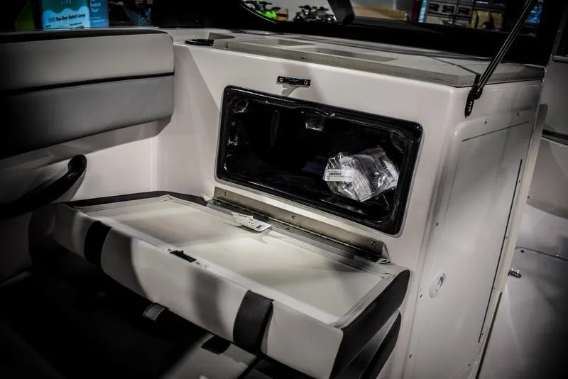 Slide: The Image of 2023 Yamaha Boats AR220 interior storage compartment. - 20