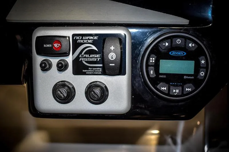 Slide: The Image of Control panel of 2023 Yamaha Boats AR220 with Cruise Assist and Jensen audio system. - 26