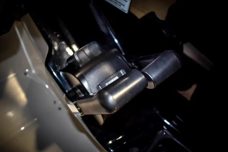 Slide: The Image of Close-up of the throttle control on a 2023 Yamaha Boats AR220. - 27