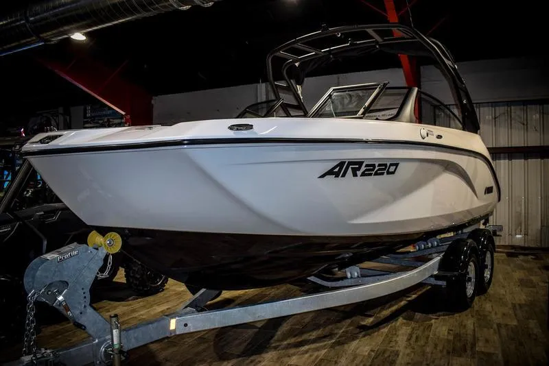 Slide: The Image of 2023 Yamaha Boats AR220 on trailer in showroom. - 3